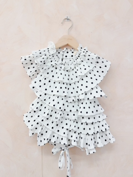 Top dos nu blanc à petit pois noir à volants plissés Lovely – top femme élégant et tendance